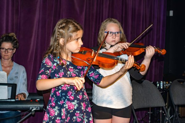 Girls playing violins